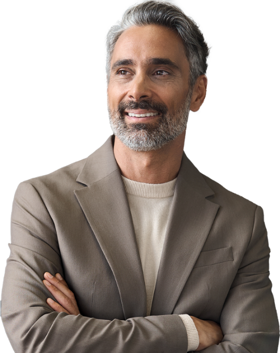 Business owner with arms crossed, smiling